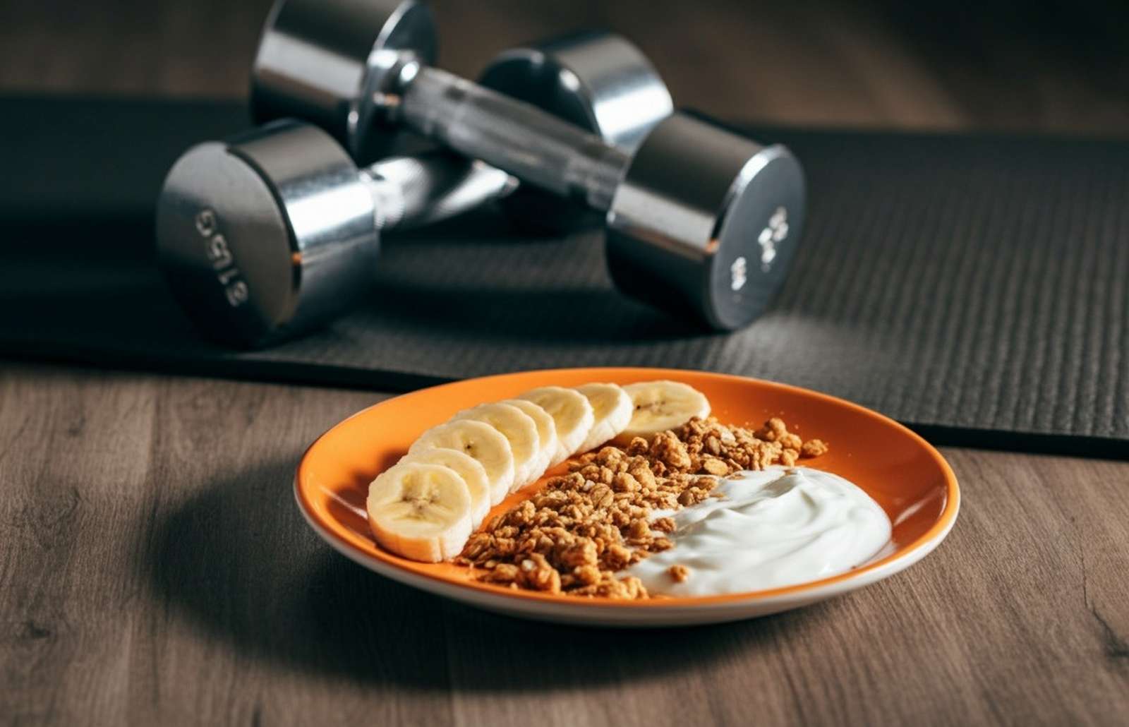 small pre workout meal with dumbbells in background