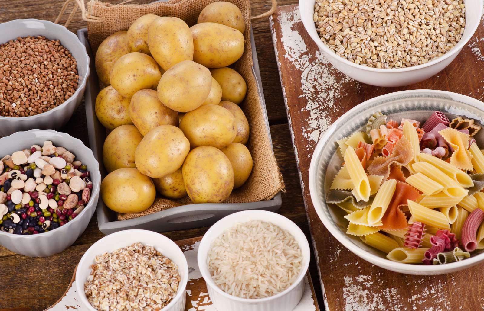 Healthy Food: Best Sources of Carbs on a wooden table. Top view