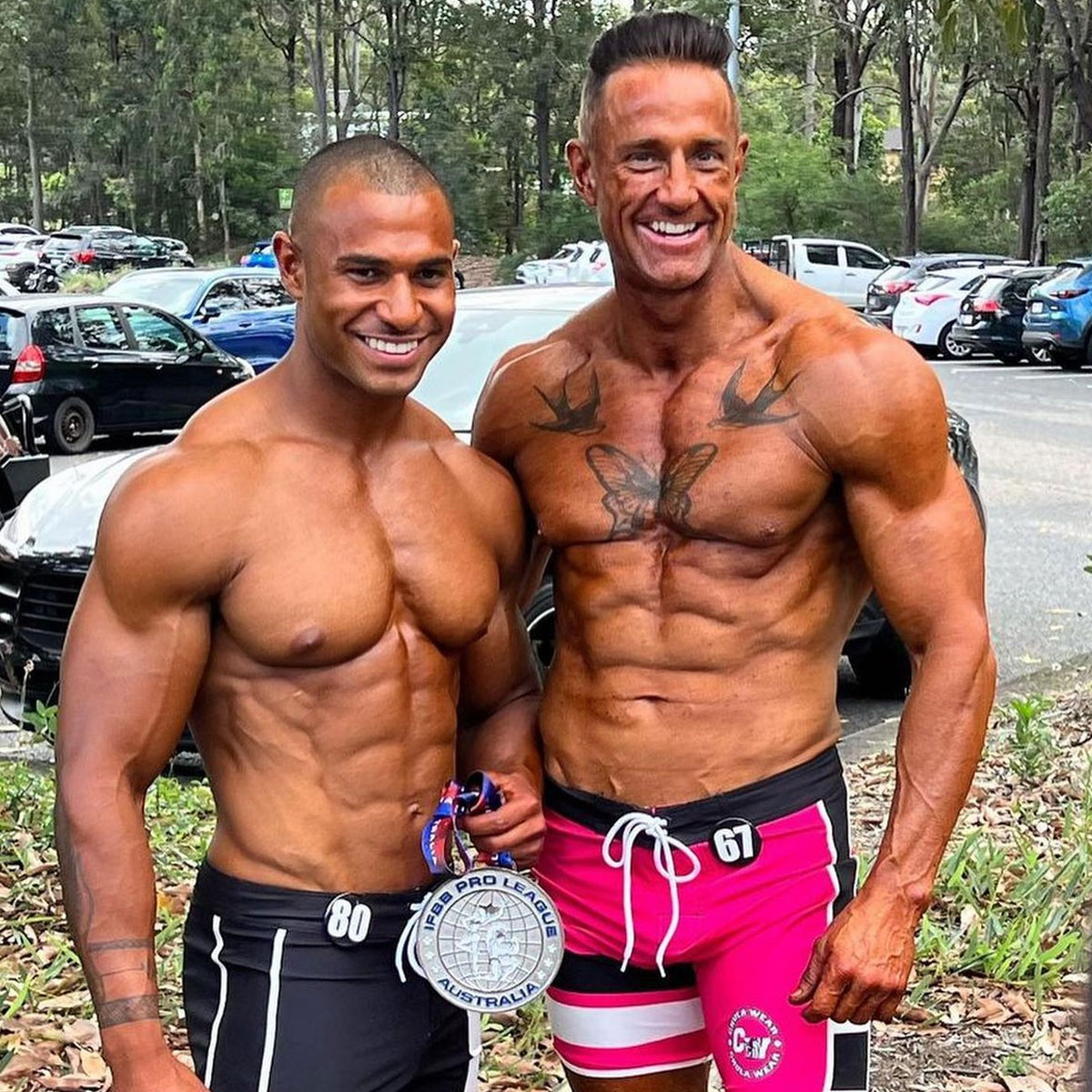 Male athletes in peak condition following months of competition prep coach work in Melbourne
