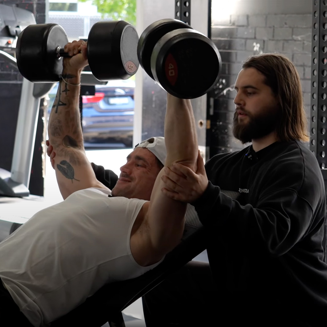 Client lifting weights during personal training services in Melbourne at Strength Lab