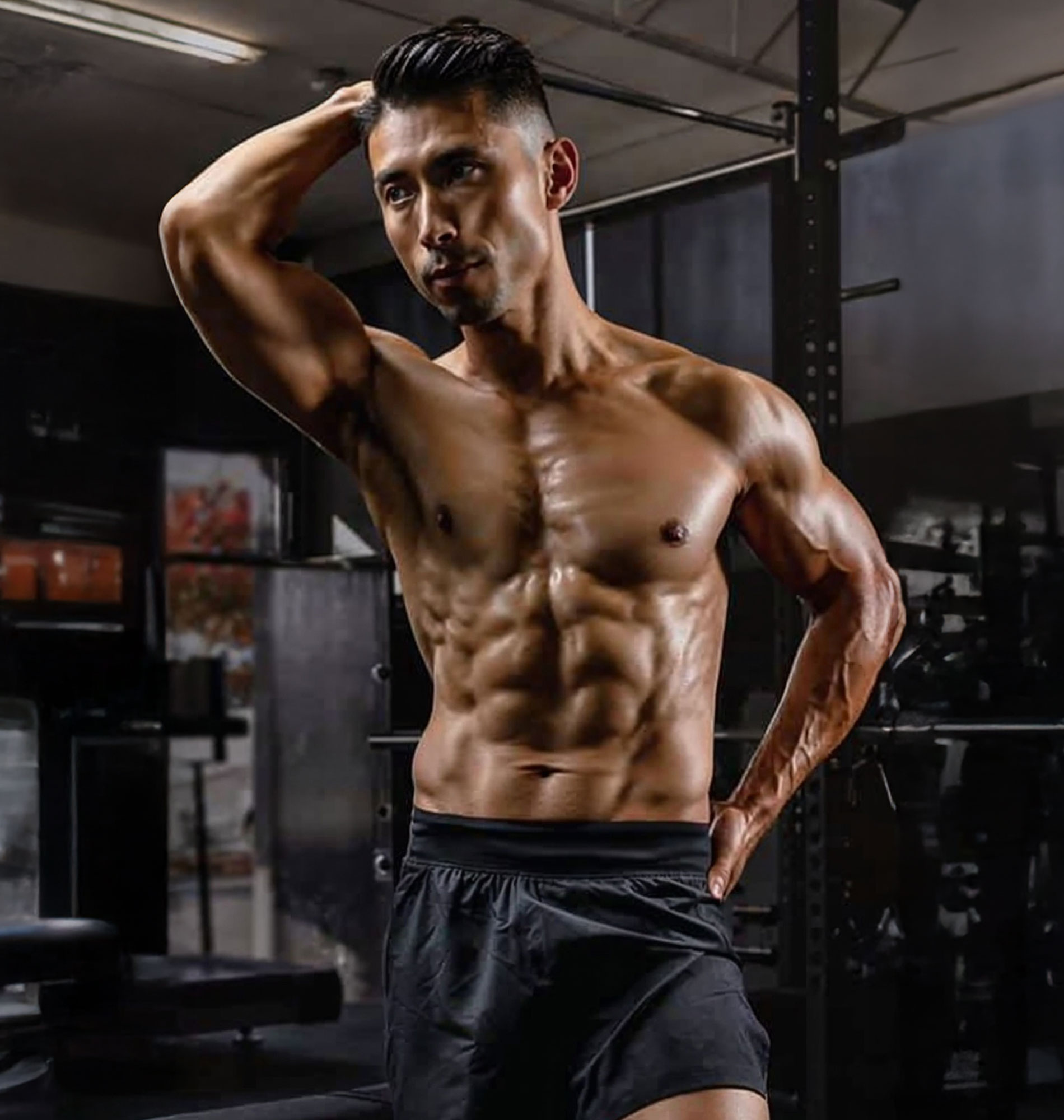Client showing off body transformation after fat loss training at Strength Lab Melbourne