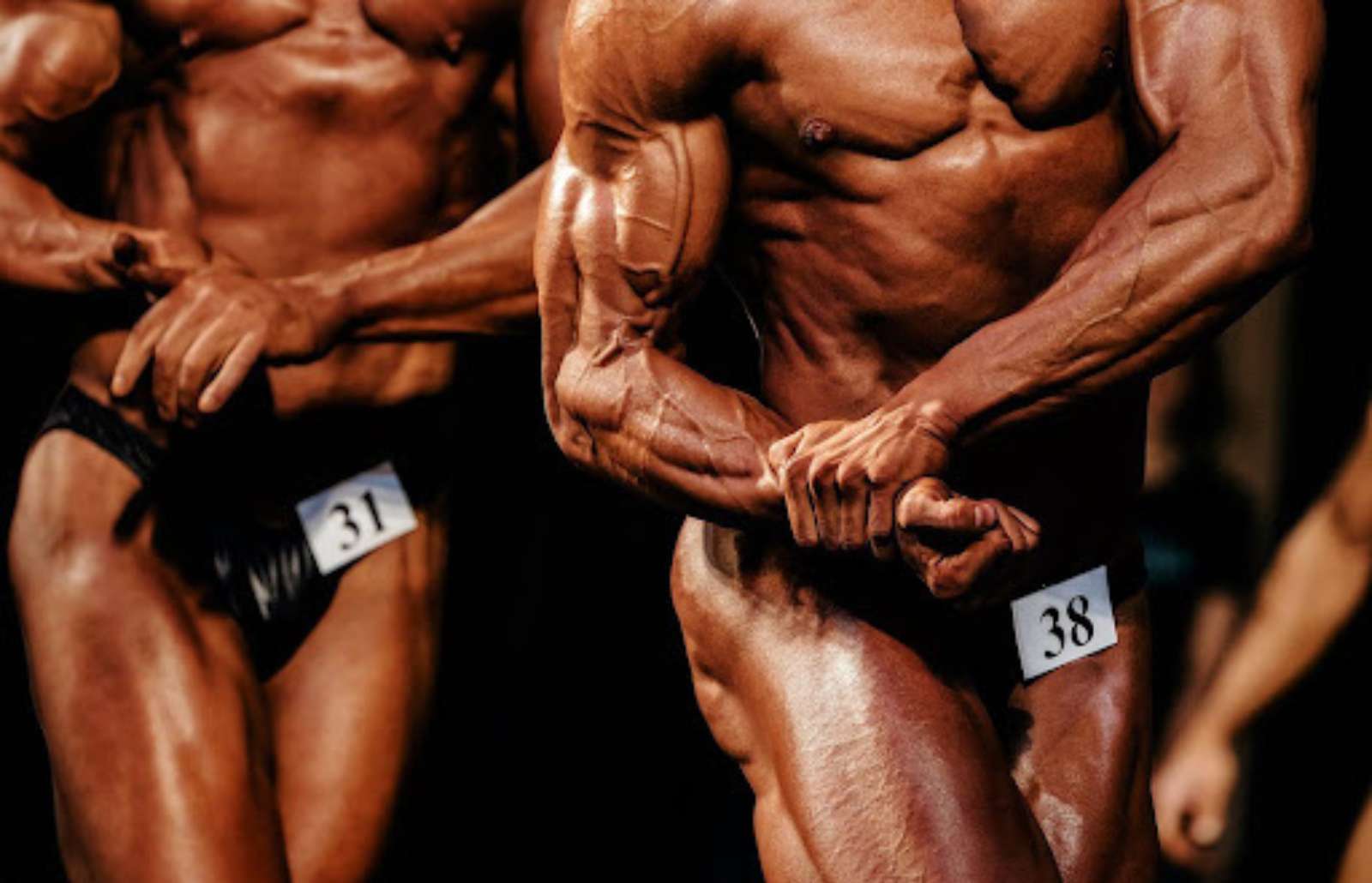 Bodybuilder posing at a bodybuilding competition
